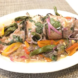 Stage 4: removed and plated fish, preparing for deboning