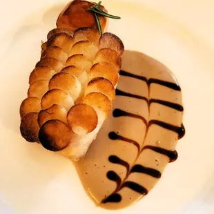 Snapper in potato scales