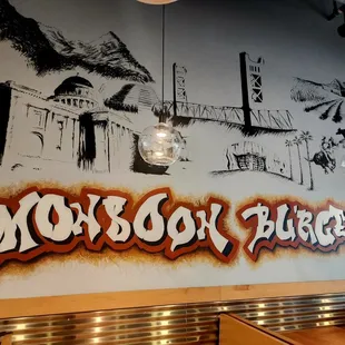 a mural on the wall of a restaurant