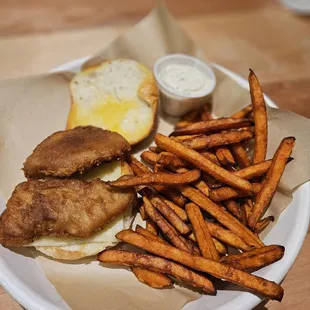 Fish burger with side of sweet potato fries