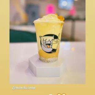 a photo of a mango smoothie