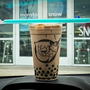 Black milk tea with boba and an awesome Tiffany blue colored straw