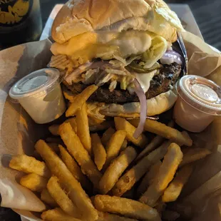 a basket of fries and a beer