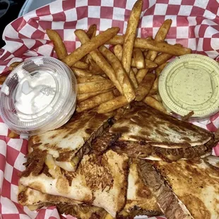 Brisket quesadilla plate...w sour creme n avocado sauce