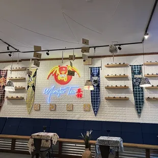 a row of surfboards hanging on the wall