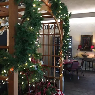a dining room with christmas decorations