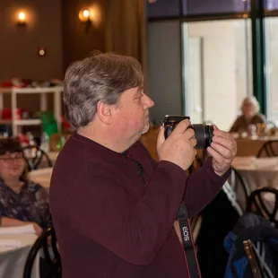 Snapping photos of the events