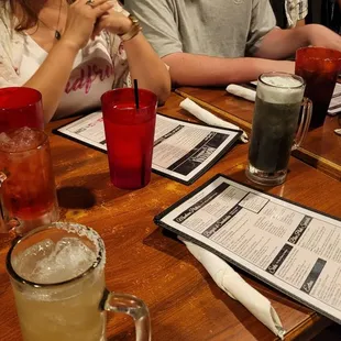 a group of people sitting at a table