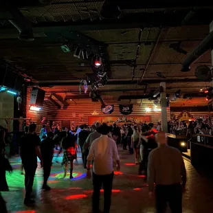 people dancing in a dance hall