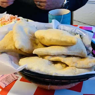 These are the sopapillas, you drizzle some honey over it! They taste homemade! Super delicious!