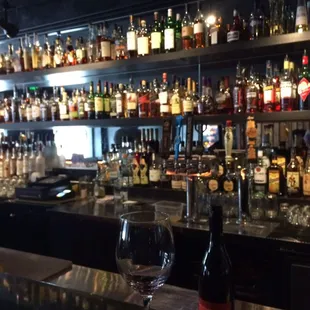 a bottle of wine and two glasses