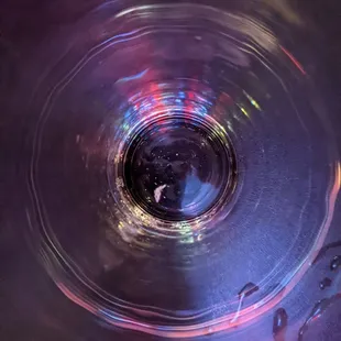 Large particles and debris at the bottom of the glass of water... GROSS!