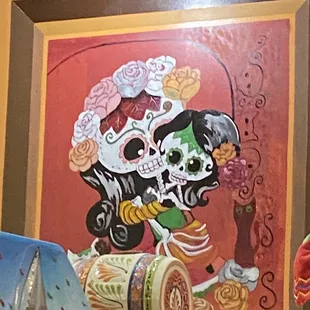 a painting of a mexican woman