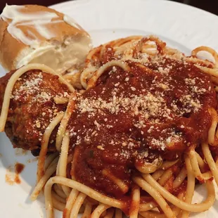 Spaghetti with Two Meatballs (half portion here) $11.50 from Grubhub (3/5); came with bread. Traditional home style Italian food.