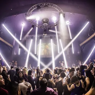 a crowd of people at a nightclub