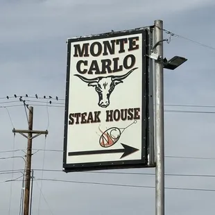 a sign for monte carlo steak house