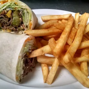 Steak wrap w\ fries platter.