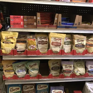 shelves of cheese and bread