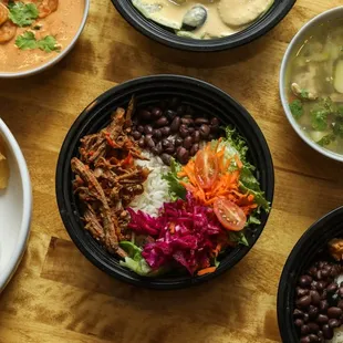 a variety of dishes of food