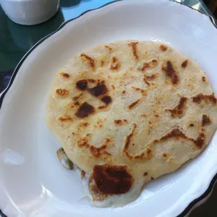 one pupusa with loroco