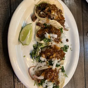 three tacos on a plate