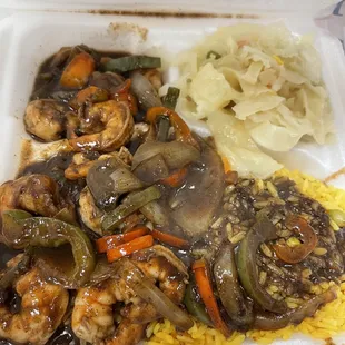 Jerk shrimp , yellow rice and cabbage