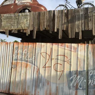 The entrance from the back resembles a junk yard!