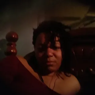 a woman laying in bed