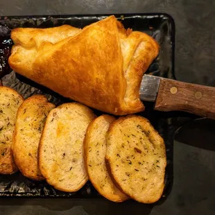 Baked Brie with bread and strawberries is an absolute delight for the senses!  #CheeseLovers #AppetizerGoals