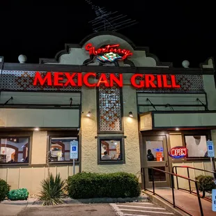 Outside. Storefront signage facing 15-501. Located in the Oak Creek Village shopping center.