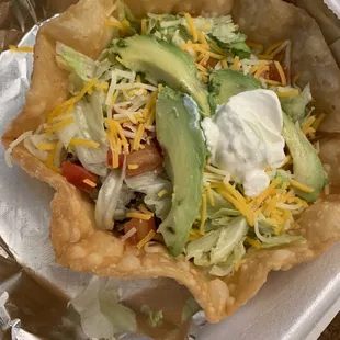 Taco salad with delicious tortilla bowl.