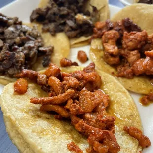 three tacos on a plate
