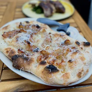 Casal Bertone: Mozzarella, Crispy Guanciale, Pecorino, Chestnut Honey | $19 (Terrible pic but it&apos;s bomb!)