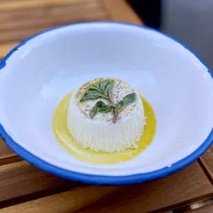 Pannacotta Al Finocchietto; Vanilla Bean and Wild Fennel Pannacotta, Extra Virgin Olive Oil | $13
