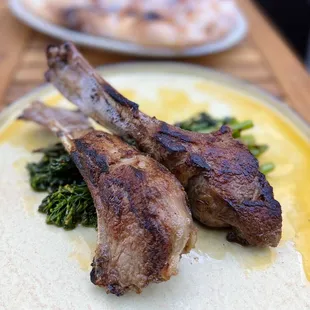 Abbacchio Scottadito: Cast Iron Lamb Chops, Rapini, Garlic Rosemary Oil | $34 (perfectly medium rare as requested)