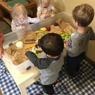 Sensory bins add to the learning with scooping, sorting, and textures