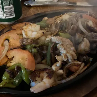 The food was excellent! I got the Texan Fajita, which had shrimp, chicken, and beef (pictured). It was really good.