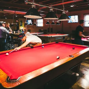 a man playing pool