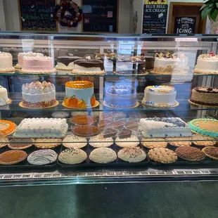 a display of cakes and pastries