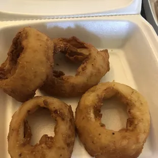 This is what they consider a large Onion Ring order, at $5.  Horrible!‍