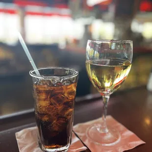 a drink and a glass of wine