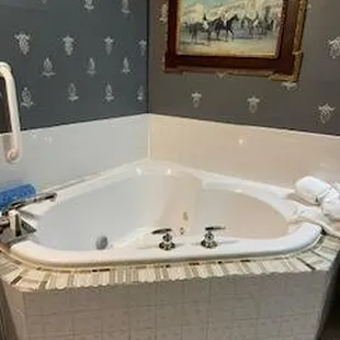 tub with left over tile and rough grout