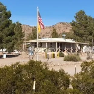 Join us on our covered porch for Friday Happy Hour. Cheers!