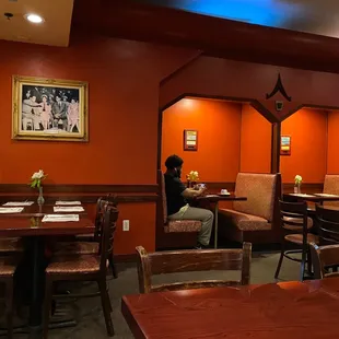 a woman sitting at a table