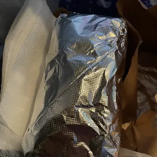 a sandwich wrapped in foil