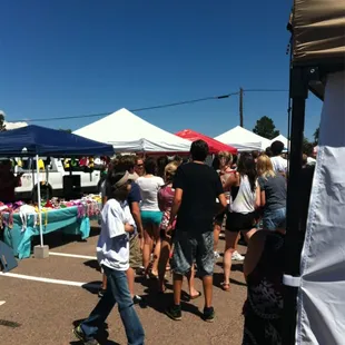 a crowd of people shopping