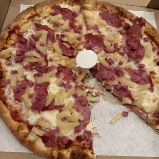 Hawaiian. Bacon had unpleasant gasoline aroma