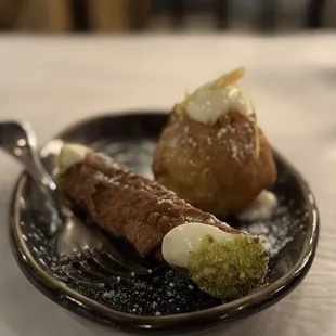 This is Heaven in "THAT" cannoli, and a Italian doughnut, Both with a silky cream that will change your life..