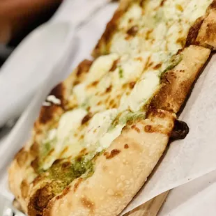 Five cheese pesto pizza