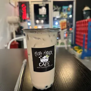 caramel milk tea with black tea, tapioca pearls, and an extra pump of caramel.